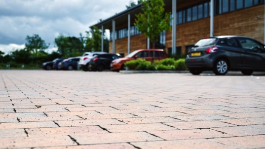 3.10	An example of a car park laid with permeable block pavers	An image showing a car park surfaced with permeable block pavers designed to allow rainwater to drain through the gaps into the ground below.