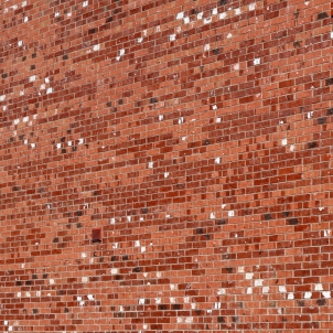 Fig 7.13: An example of a wall with an unnecessary and inappropriate variety of tones and artificially distressed bricks
